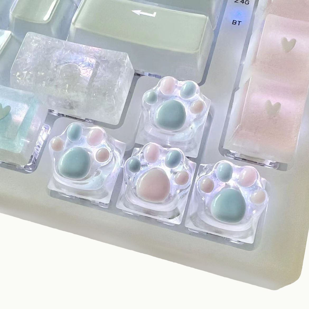 Cute pink and blue cat paw keycap with backlight, perfect for girls.